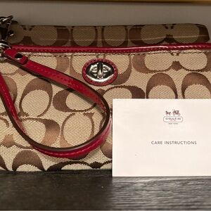 Coach khaki and Black Cherry Signature Medium Wristlet NWT